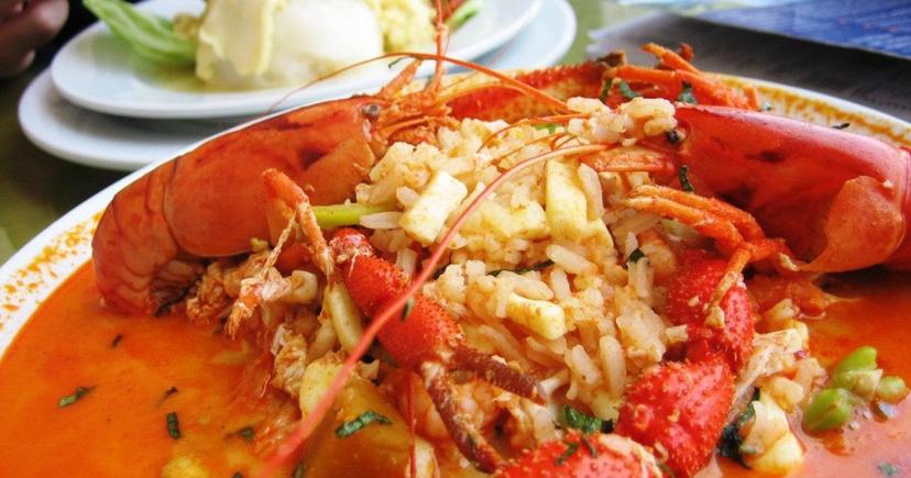 <div class="entry-thumb-caption">Chupe de Camarones—a thick soup made with tomato, shrimps, and hot pepper—is an Arequipa classic. Image: "<a href="https://flic.kr/p/EEt6bt" rel="noopener">Chupe de camarones - Cocina Peruana</a>" by <a href="https://www.flickr.com/photos/134894678@N07/" rel="noopener">MI PERÚ</a> is licensed under <a href="https://creativecommons.org/publicdomain/mark/1.0/" rel="noopener">Public Domain Mark 1.0</a>.</div>