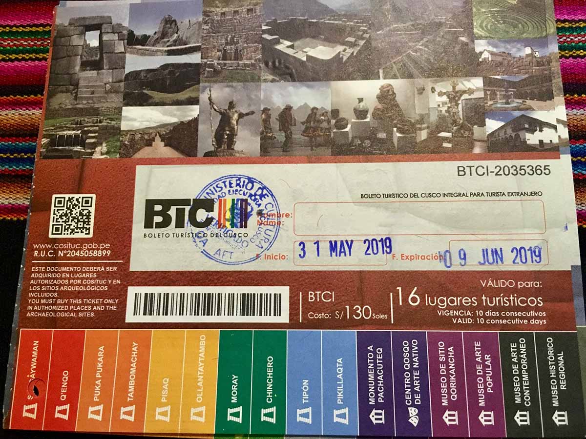 The Cusco Tourist ticket is a rainbow colored ticket giving entry to several landmarks in Peru