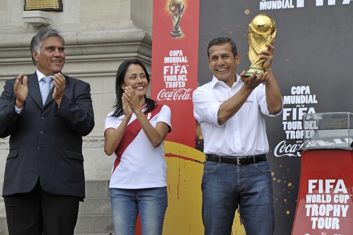 Ollanta Humala, president of Peru, holding the FIFA World Cup Trophy.