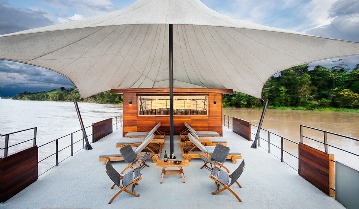 Lounge chairs sit atop the Amazon Cruise ship.