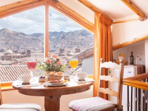 A table set for breakfast overlooking Cusco at Casa San Blas Boutique Hotel.