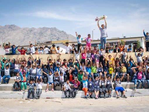 Kids posing at a Concrete Jungle Foundation project.