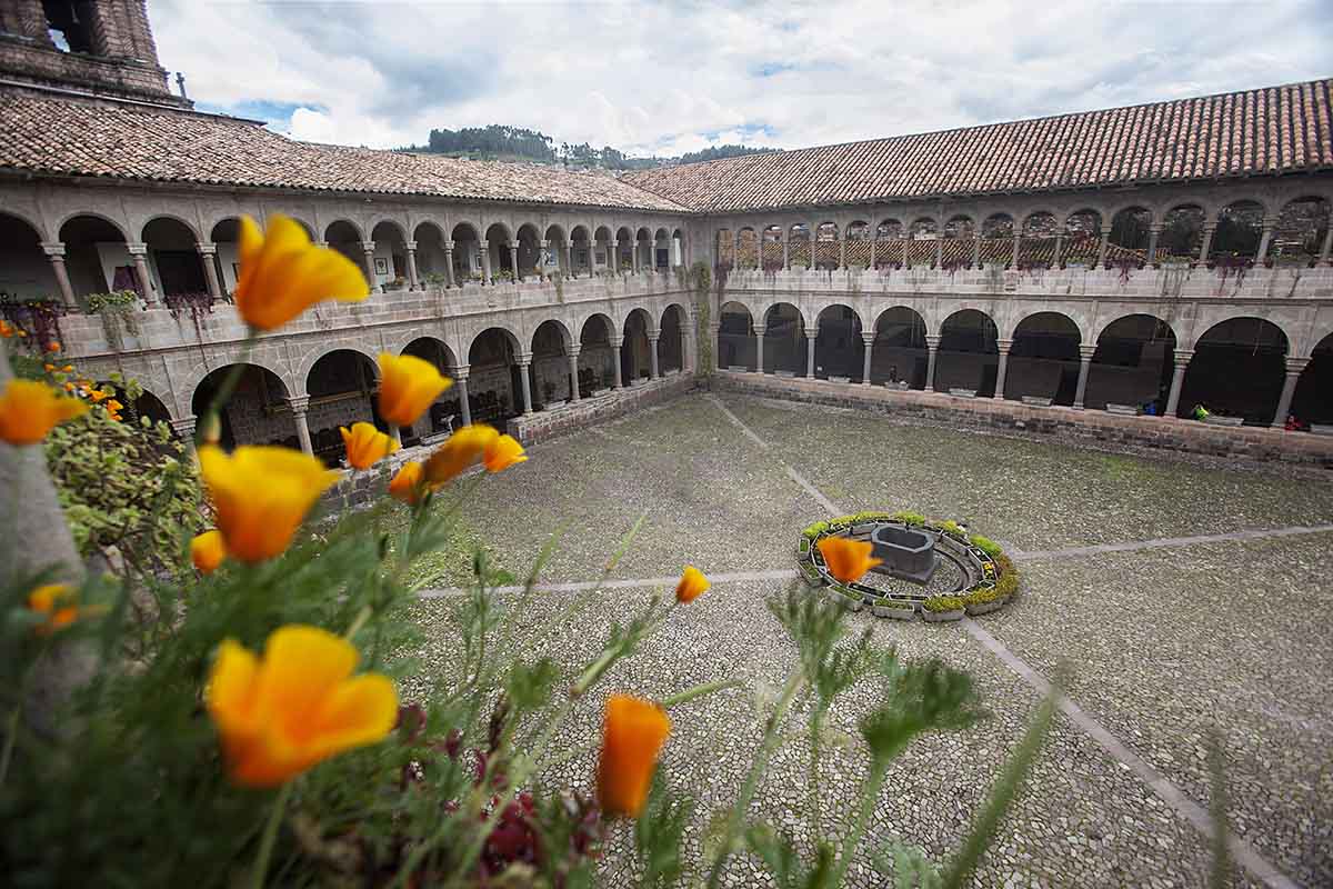 Two stories surround the Coricancha courtyard with a small fountain in the middle.