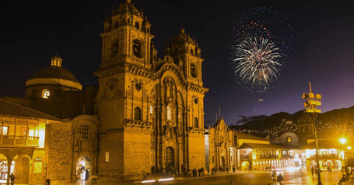 Cusco Plaza de Armas with a Firework in the night sky during the holiday season.