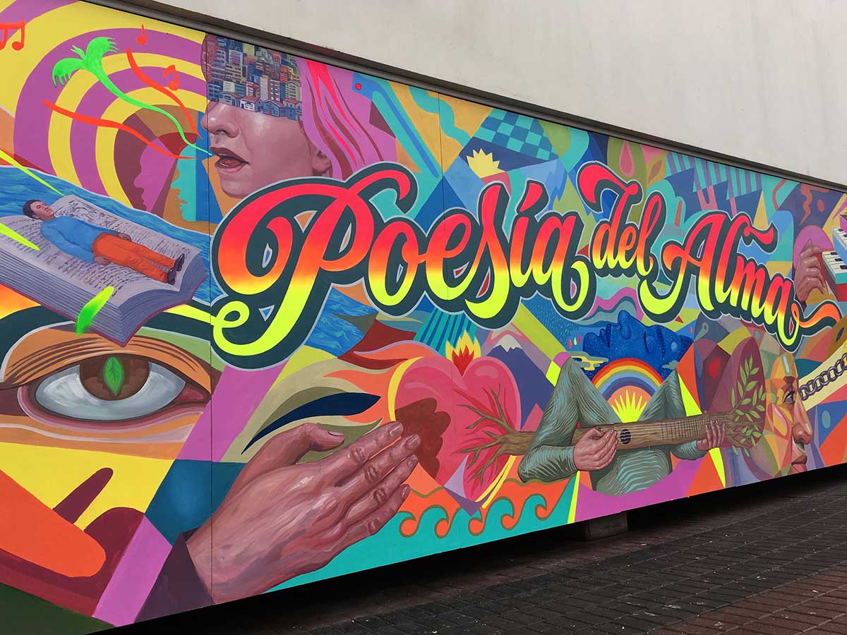 Colorful mural by chicha artist Elliot Tupac. Superimposed words translate to "Poetry of the soul."