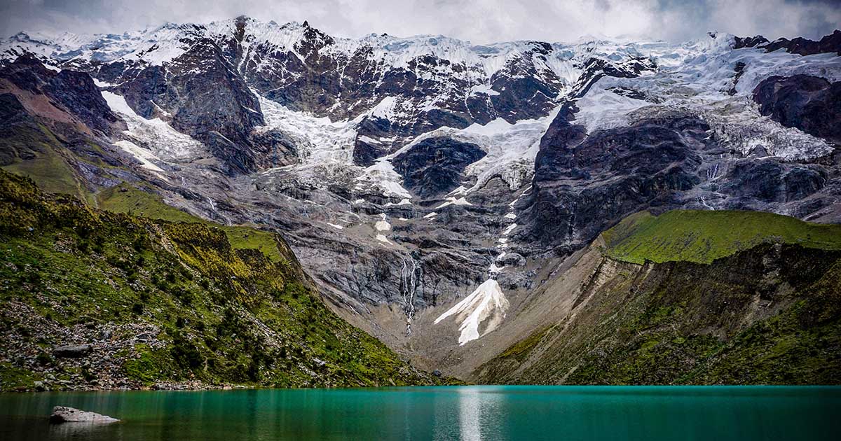 Glaciers feed minerals to Humantay Lake to give it its emerald and blue color.