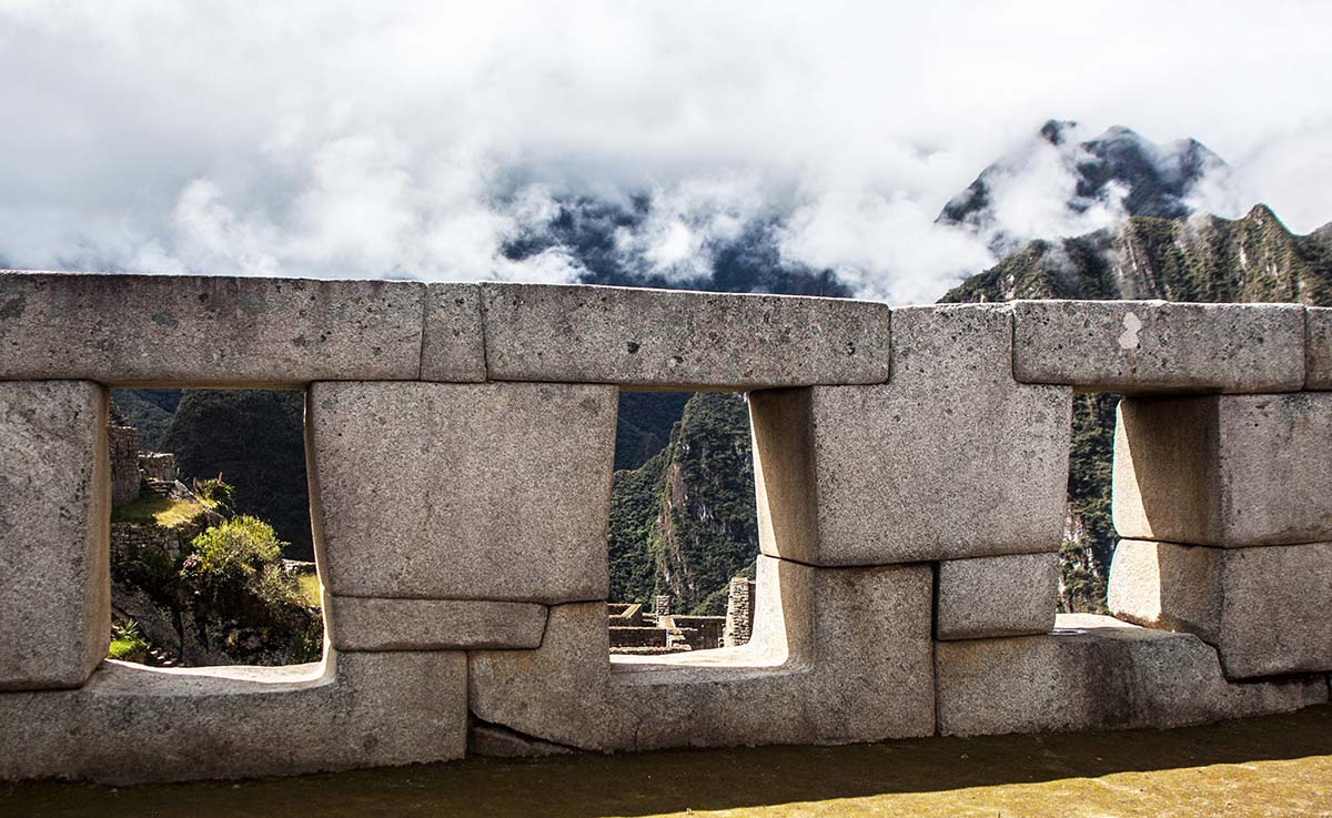 The Incan temple of the three windows with a trapezoidal structure typical of Incan architecture.