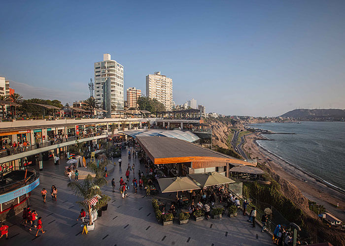The Larcomar shopping center in Miraflores with the Pacific Ocean and the Morro del Solar visible.
