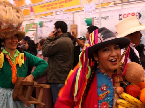 Woman holds Peruvian fruits at the Mistura Food Festival, South America's largest gastronomic event
