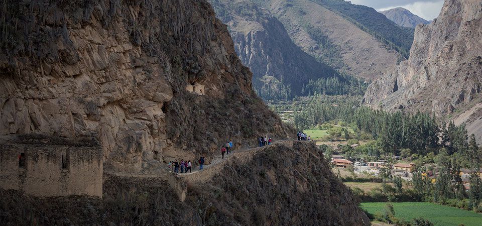 Cliffsides overlooking the valleys of Ollantaytambo, a village in the sacred valley that is home to a famous Inca fortress